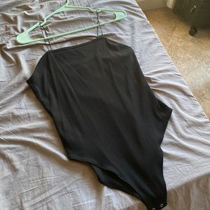 Women’s black bodysuit from Target. Size L
